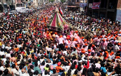 Hindu devotees pull the "rath" or chariot of Lord Jagannath during Rath Yatra in Ahmedabad